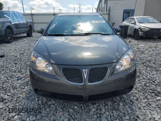 2007 Pontiac G6 GT with VIN 1G2ZH18NX74127920, listed as a Copart auction lot 52950365 with 127,428 mi miles and Salvage title. Bid and sale history available at DreamBid. Image 5.