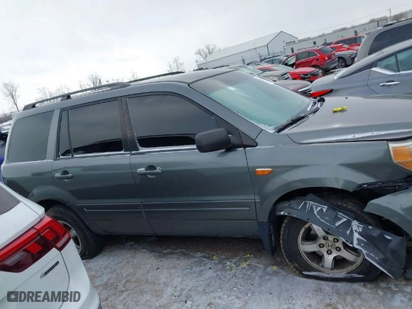 2007 Honda Pilot EX with VIN 2HKYF18427H513083, listed as a IAAI auction lot 41376346 with 301,841 mi miles. Bid and sale history available at carsss.com. Image 13.
