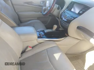 2014 Infiniti QX60 with VIN 5N1AL0MM0EC555055, listed as a IAAI auction lot 41880143 with 128,536 mi miles and . Bid and sale history available at carsss.com. Image 5.