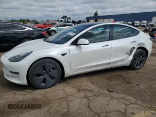 2023 Tesla Model 3 with VIN 5YJ3E1EA0PF575488, listed as a Copart auction lot 56889115 with 18,677 mi miles and Clean title. Bid and sale history available at DreamBid. Image 1.