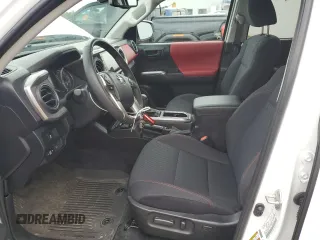 2023 Toyota Tacoma SR with VIN 3TMCZ5AN2PM642205, listed as a Copart auction lot 61045955 with 10,596 mi miles and Salvage title. Bid and sale history available at DreamBid. Image 7.