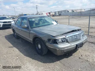 2001 Ford Crown Victoria LX with VIN 2FAFP74W01X102534, listed as a IAAI auction lot 42017605 with 160,063 mi miles. Bid and sale history available at carsss.com. Image 1.