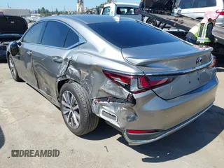 2021 Lexus ES 300h with VIN 58ACA1C1XMU007576, listed as a IAAI auction lot 42302934 with 24,614 mi miles and . Bid and sale history available at DreamBid. Image 3.