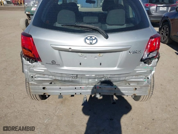 2015 Toyota Yaris L with VIN VNKJTUD38FA020465, listed as a IAAI auction lot 41416577 with 142,751 mi miles. Bid and sale history available at carsss.com. Image 6.