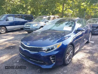 2016 Kia Optima SXL Turbo with VIN 5XXGV4L28GG087563, listed as a IAAI auction lot 39986124 with 180,160 mi miles. Bid and sale history available at carsss.com. Image 2.