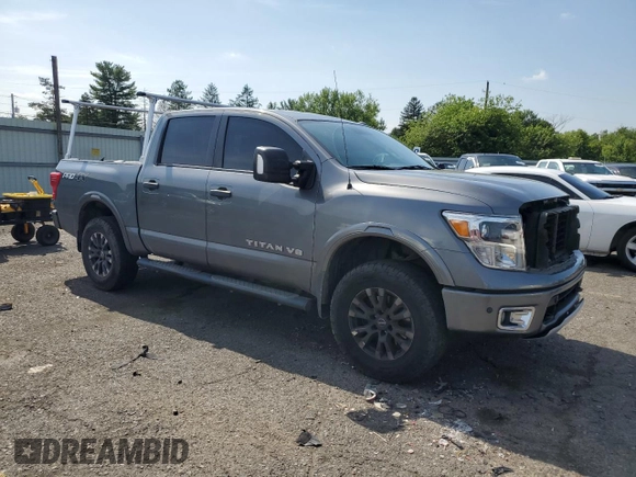 2018 Nissan Titan SV with VIN 1N6AA1E50JN514802, listed as a Copart auction lot 62342875 with 101,593 mi miles and Salvage title. Bid and sale history available at DreamBid. Image 4.
