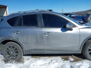 2013 Mazda CX-5 Grand Touring with VIN JM3KE4DE4D0168115, listed as a IAAI auction lot 41610004 with 190,690 mi miles. Bid and sale history available at carsss.com. Image 14.