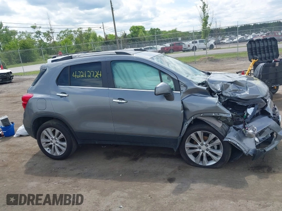 2020 Chevrolet Trax Premier with VIN 3GNCJRSB2LL140689, listed as a IAAI auction lot 42212724 with 73,701 mi miles and . Bid and sale history available at DreamBid. Image 12.