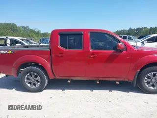 2014 Nissan Frontier S with VIN 1N6AD0EV3EN734085, listed as a IAAI auction lot 42007200 with Not provided miles and . Bid and sale history available at DreamBid. Image 12.