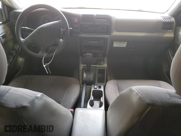 2004 Isuzu Rodeo S with VIN 4S2DM58W544300969, listed as a Copart auction lot 69563444 with 304,129 mi miles and Non Repairable. Bid and sale history available at DreamBid. Image 8.