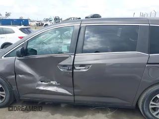 2011 Honda Odyssey EX-L with VIN 5FNRL5H61BB072124, listed as a IAAI auction lot 42115299 with 155,086 mi miles and . Bid and sale history available at DreamBid. Image 14.