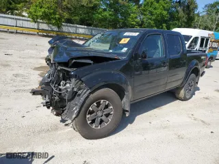 2015 Nissan Frontier PRO-4X with VIN 1N6AD0EV4FN716583, listed as a Copart auction lot 52324475 with 0 mi miles and Salvage Title. Bid and sale history available at carsss.com. Image 1.
