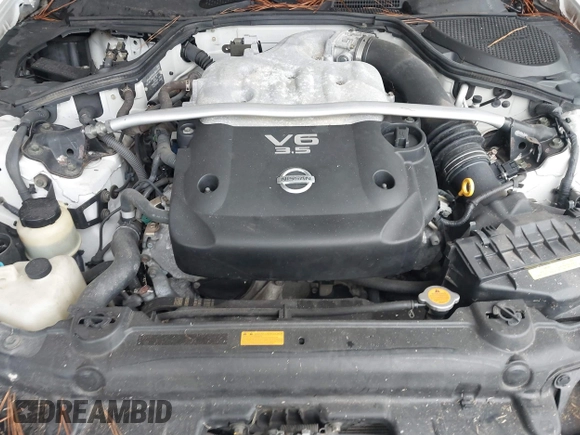 2006 Nissan 350Z Touring z VIN JN1AZ34D86M307042, wystawiony jako IAAI lot #41016528 z przebiegiem 124 303 mil mil oraz . Historia ofert i sprzedaży dostępna na DreamBid. Obrazek 10.