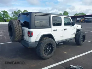 2020 Jeep Wrangler Unlimited Sport S with VIN 1C4HJXDN6LW198065, listed as a IAAI auction lot 42049279 with 72,512 mi miles. Bid and sale history available at carsss.com. Image 4.