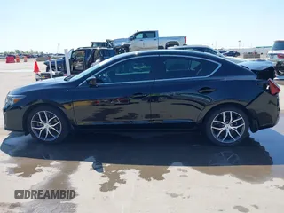 2019 Acura ILX Premium z VIN 19UDE2F70KA008102, wystawiony jako IAAI lot #41974086 z przebiegiem 134 589 mil mil oraz . Historia ofert i sprzedaży dostępna na DreamBid. Obrazek 15.