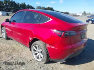 2023 Tesla Model Y Long Range with VIN 7SAYGDEE8PA121218, listed as a IAAI auction lot 41888923 with 34,796 mi miles. Bid and sale history available at carsss.com. Image 3.