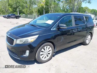 2016 Kia Sedona SX with VIN KNDMC5C15G6143818, listed as a IAAI auction lot 42051284 with 97,666 mi miles and . Bid and sale history available at carsss.com. Image 2.