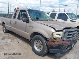 1999 Ford F-350 XL with VIN 1FTSX30F7XEC60385, listed as a IAAI auction lot 42493144 with 210,660 mi miles and . Bid and sale history available at DreamBid. Image 1.