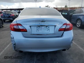 2012 Infiniti M Hybrid with VIN JN1EY1AP3CM910631, listed as a Copart auction lot 49162705 with 128,771 mi miles and Salvage title. Bid and sale history available at DreamBid. Image 6.