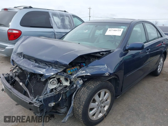 2004 Toyota Camry LE with VIN 4T1BF30K44U069441, listed as a IAAI auction lot 41740124 with 145,906 mi miles. Bid and sale history available at carsss.com. Image 2.