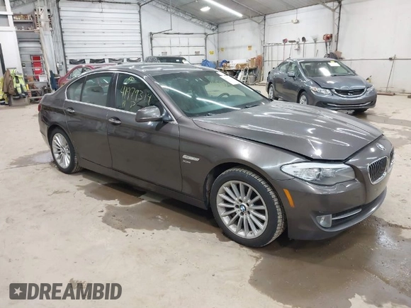 2011 BMW 5 Series 535i xDrive with VIN WBAFU7C53BDU54623, listed as a IAAI auction lot 41979314 with 202,522 mi miles. Bid and sale history available at carsss.com. Image 1.