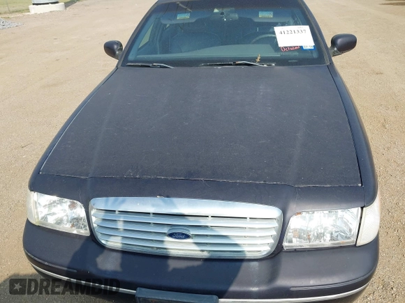 2000 Ford Crown Victoria LX z VIN 2FAFP74W4YX188831, wystawiony jako IAAI lot #41221337 z przebiegiem 169 380 mil mil oraz . Historia ofert i sprzedaży dostępna na DreamBid. Obrazek 6.