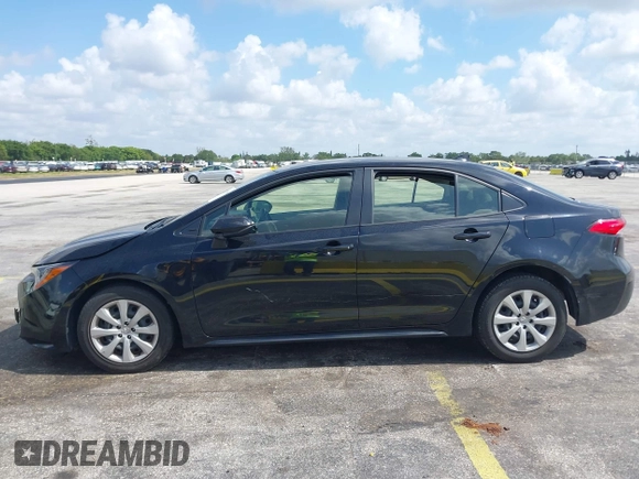 2023 Toyota Corolla LE with VIN JTDB4MEE2PJ004869, listed as a IAAI auction lot 42139964 with 41,119 mi miles. Bid and sale history available at carsss.com. Image 14.