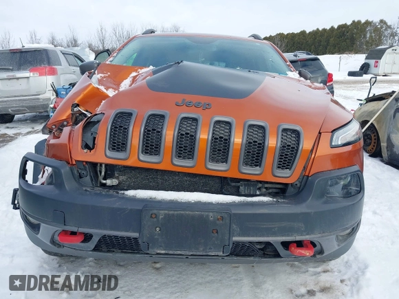 2015 Jeep Cherokee Trailhawk with VIN 1C4PJMBS9FW655233, listed as a IAAI auction lot 41430715 with 138,181 mi miles and . Bid and sale history available at carsss.com. Image 13.