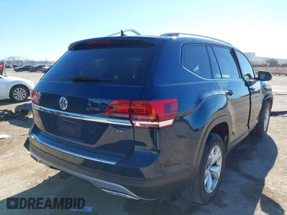 2019 Volkswagen Atlas SE with VIN 1V2DR2CA9KC506188, listed as a IAAI auction lot 41221389 with 67,593 mi miles and . Bid and sale history available at DreamBid. Image 4.