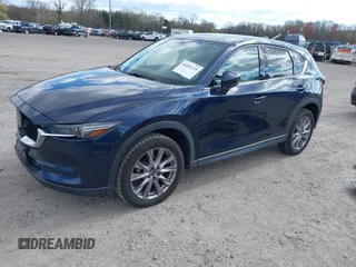 2019 Mazda CX-5 Grand Touring with VIN JM3KFBDM2K0603400, listed as a IAAI auction lot 42051135 with 59,448 mi miles and . Bid and sale history available at DreamBid. Image 17.