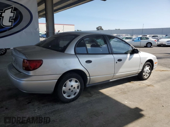 2002 Saturn SL with VIN 1G8ZH52882Z177307, listed as a Copart auction lot 59407345 with 63,864 mi miles and Clean title. Bid and sale history available at DreamBid. Image 3.
