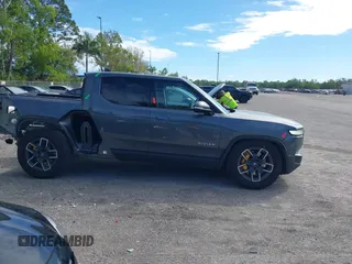 2022 Rivian R1T Launch Edition with VIN 7FCTGAAL9NN004060, listed as a IAAI auction lot 41637884 with 40,268 mi miles. Bid and sale history available at carsss.com. Image 14.