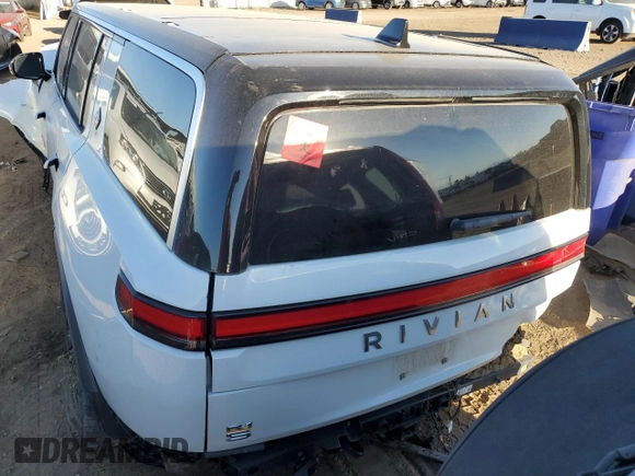 2023 Rivian R1S Launch Edition with VIN 7PDSGABL3PN003708, listed as a Copart auction lot 71564604 with Not Provided miles and Salvage Title. Bid and sale history available at carsss.com. Image 6.