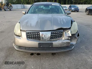 2004 Nissan Maxima SE with VIN 1N4BA41E24C878448, listed as a Copart auction lot 72596984 with 329,525 mi miles and Salvage Title. Bid and sale history available at carsss.com. Image 5.