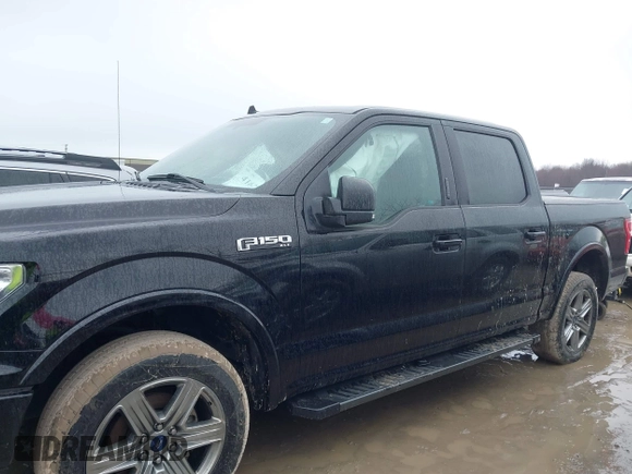 2018 Ford F-150 XL with VIN 1FTEW1E57JFA51993, listed as a IAAI auction lot 41620187 with 103,449 mi miles. Bid and sale history available at carsss.com. Image 14.