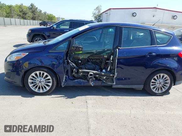 2017 Ford C-Max SE z VIN 1FADP5AU0HL115421, wystawiony jako IAAI lot #42216348 z przebiegiem 145 415 mil mil oraz . Historia ofert i sprzedaży dostępna na DreamBid. Obrazek 6.