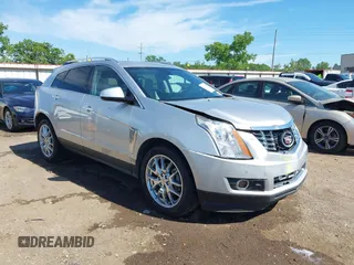 2014 Cadillac SRX Premium Collection z VIN 3GYFNDE34ES609432, wystawiony jako IAAI lot #42227965 z przebiegiem 59 670 mil mil oraz . Historia ofert i sprzedaży dostępna na DreamBid. Obrazek 1.