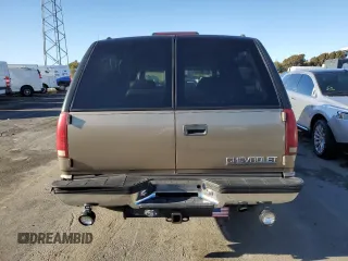 1996 Chevrolet Suburban z VIN 3GNGK26JXTG107228, wystawiony jako Copart lot #44741195 z przebiegiem 172 053 mil mil oraz Czysty tytuł • Clean title. Historia ofert i sprzedaży dostępna na DreamBid. Obrazek 6.
