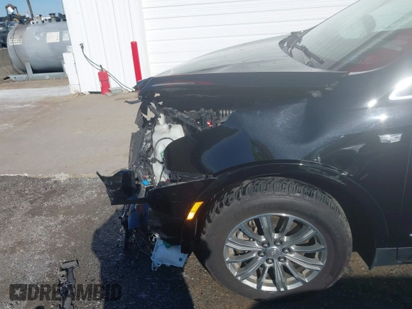 2017 Cadillac XT5 Luxury FWD with VIN 1GYKNBRS5HZ164209, listed as a IAAI auction lot 41213572 with 144,039 mi miles. Bid and sale history available at carsss.com. Image 18.
