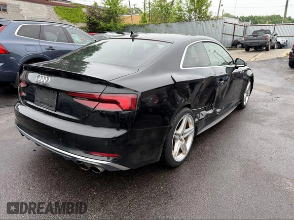 2018 Audi S5 Premium Plus with VIN WAUP4AF59JA077177, listed as a IAAI auction lot 42218794 with 86,654 mi miles and . Bid and sale history available at DreamBid. Image 4.
