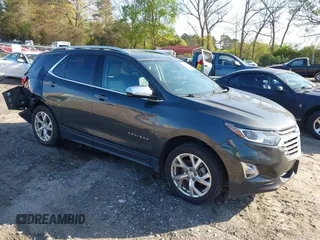 2021 Chevrolet Equinox Premier z VIN 2GNAXXEV3M6134776, wystawiony jako IAAI lot #41986710 z przebiegiem 201 731 mil mil oraz . Historia ofert i sprzedaży dostępna na DreamBid. Obrazek 1.