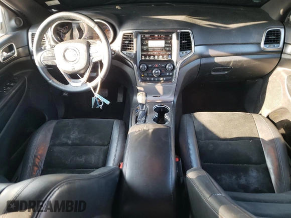 2017 Jeep Grand Cherokee Altitude with VIN 1C4RJEAG9HC702812, listed as a Copart auction lot 62423495 with 162,982 mi miles and Salvage title. Bid and sale history available at DreamBid. Image 8.