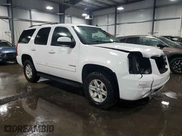 2014 GMC Yukon SLT with VIN 1GKS2CE01ER123696, listed as a Copart auction lot 63401554 with 177,174 mi miles and Salvage Title. Bid and sale history available at carsss.com. Image 4.