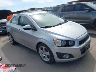 2012 Chevrolet Sonic LTZ z VIN 1G1JE5SB8C4210627, wystawiony jako IAAI lot #41662225 z przebiegiem 72 358 mil mil oraz . Historia ofert i sprzedaży dostępna na DreamBid. Obrazek 1.