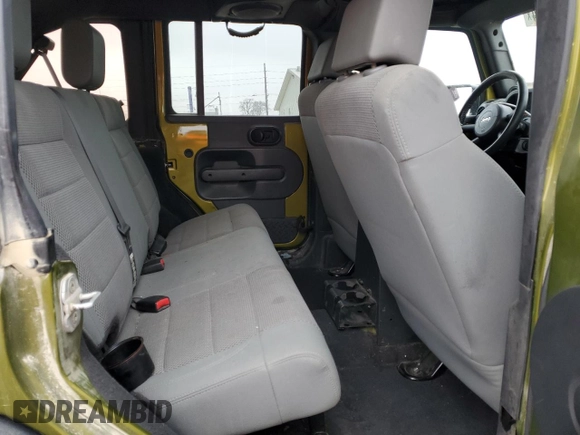 2007 Jeep Wrangler Unlimited Rubicon с VIN 1J4GA691X7L145737, выставлен на аукционе Copart как лот 86277914 с пробегом 285 624 миль миль и Списание • Salvage title. История ставок и продаж доступна на DreamBid. Изображение 10.