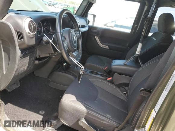 2015 Jeep Wrangler Unlimited Rubicon with VIN 1C4BJWFGXFL752602, listed as a Copart auction lot 54102395 with 26,466 mi miles and Salvage title. Bid and sale history available at DreamBid. Image 7.