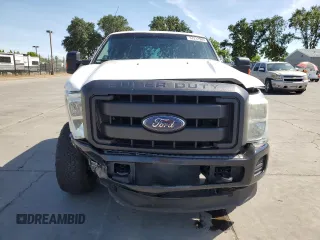 2014 Ford F-250 XL with VIN 1FT7X2B64EEB66846, listed as a Copart auction lot 57212565 with 261,721 mi miles and Salvage title. Bid and sale history available at DreamBid. Image 5.