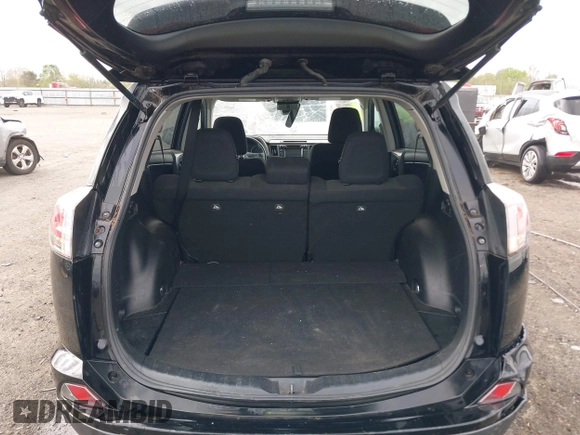 2018 Toyota RAV4 XLE with VIN 2T3WFREV9JW412755, listed as a IAAI auction lot 41889960 with 216,451 mi miles and . Bid and sale history available at carsss.com. Image 17.