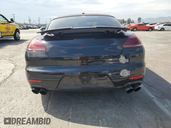 2014 Porsche Panamera Turbo z VIN WP0AC2A72EL073234, wystawiony jako Copart lot #65813464 z przebiegiem 83 918 mil mil oraz Szkoda całkowita • Salvage title. Historia ofert i sprzedaży dostępna na DreamBid. Obrazek 6.