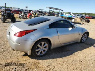 2004 Nissan 350Z Touring with VIN JN1AZ34E54T061403, listed as a Copart auction lot 57346704 with 127,602 mi miles and Salvage Title. Bid and sale history available at carsss.com. Image 3.